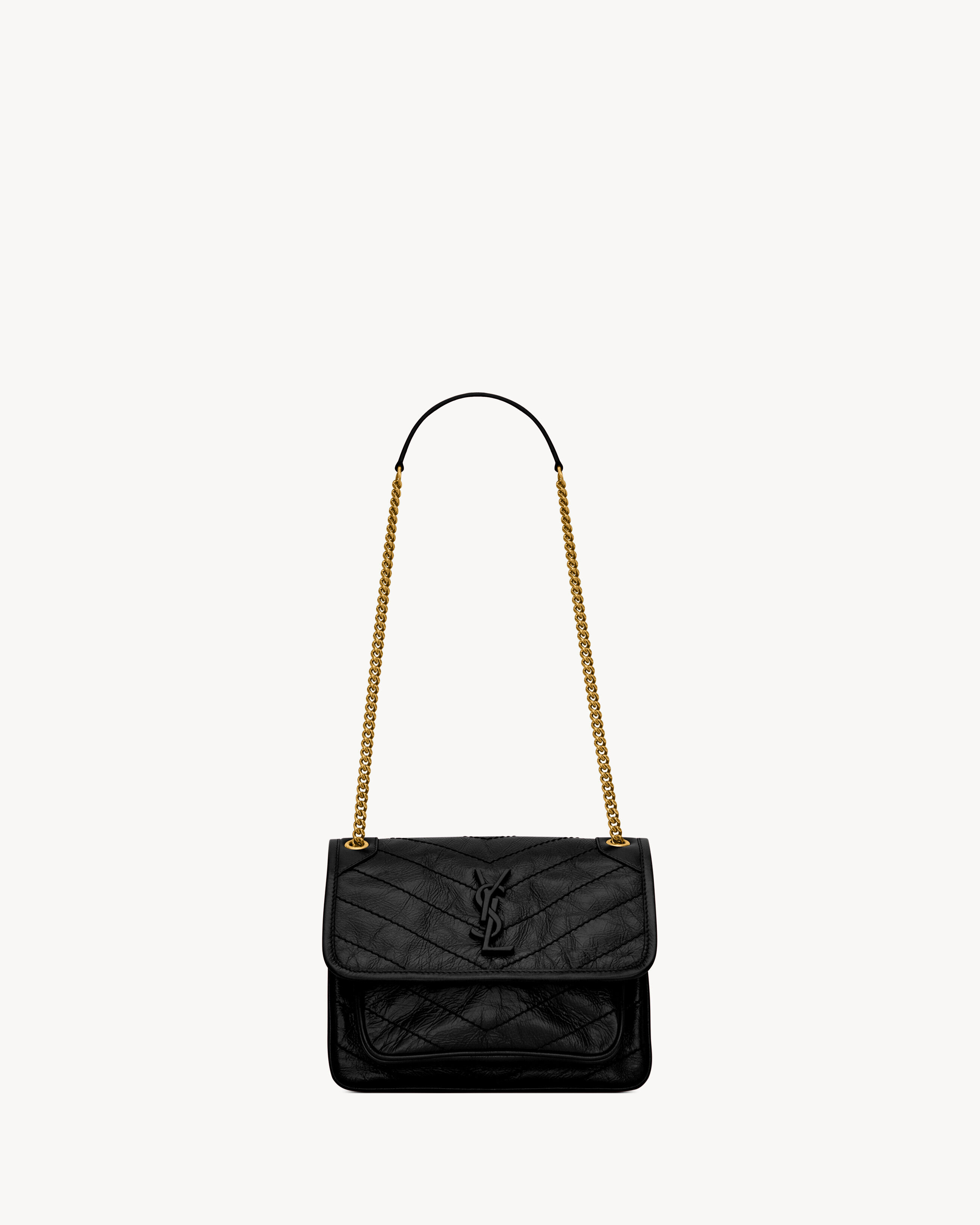 Saint Laurent Niki Baby In Vintage Leather - Black - Women